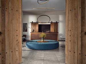 a room with a round table in the middle of it at Eagles Villas - Small Luxury Hotels of The World in Ouranoupoli