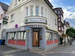 a building with a sign on the front of it at Dalyan-Home in Boppard