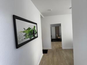 a picture hanging on a wall in a room at Dream Holiday Haus in Uetersen +1 photo