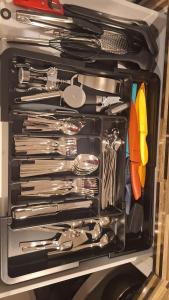 a drawer filled with lots of utensils at Parva Domus XL in Xanten +34 photos
