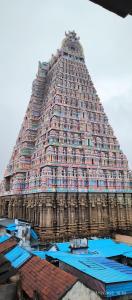 a large building with a lot of windows at DD COZY INN sntower in Tiruchirappalli