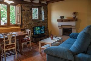 Posezení v ubytování El Mijolar Apartamentos