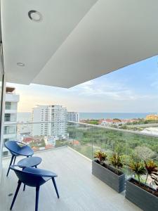 a balcony with a view of the ocean at Luxury Ocean View Aparment in Cartagena de Indias