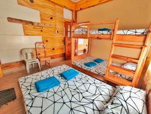 an overhead view of a bedroom with bunk beds at Sagada Staycation with Mountain View - 1st Floor in Sagada