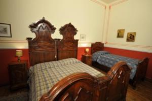 Ένα ή περισσότερα κρεβάτια σε δωμάτιο στο Agriturismo Giorgio Colutta