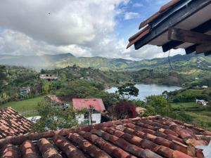 a view of a river from a roof at Hotel Montañitas in Guatapé