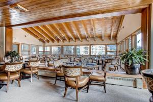 a large dining room with tables and chairs at Keystone Lodge & Spa, A Vail Resorts Property in Keystone