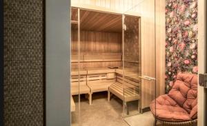 a room with a desk and a chair at Boutique Hotel Lumiere in Eindhoven