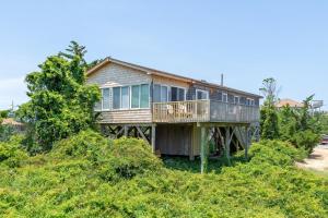 a house sitting on top of a hill at AV67 Diamond Shoals 67 in Avon