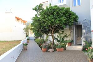 Vonkajšia záhrada v ubytovaní Melissa Apartments, Studios & Suites