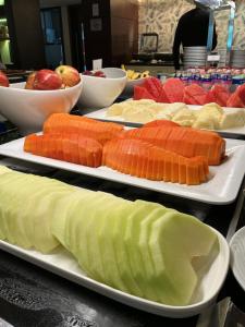 a table with two trays of sushi on at Blue Tree Premium Alphaville in Barueri