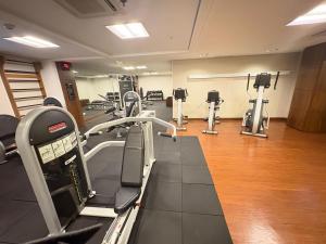 a gym with several treadmills and cardio machines at Blue Tree Premium Alphaville in Barueri