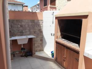 a bathroom with a sink and a shower at MyM in Costa Azul