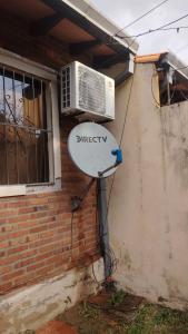 a air conditioner on the side of a building at Lemai Inmobiliaria in Barrio Caacupé Mí