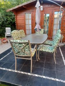 a table and chairs sitting on a patio at bonito estudio equipado in Alcorcón