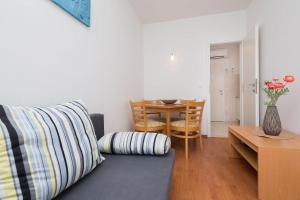 Posedenie v ubytovaní Beachfront Apartments Lara