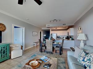 a living room with a couch and a table at The Indies #209 in Fort Morgan