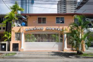 a building with a macuedo hostel sign on it at El Machico Hostel in Panama City