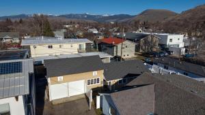 an aerial view of a city with buildings and mountains at Rose Park Hideaway in Missoula