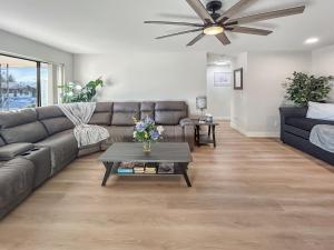 a living room with a couch and a table at Gather Together home in Montrose