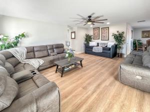 a living room with a couch and a table at Gather Together home in Montrose