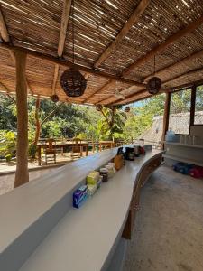 a large long white counter in a building at Loft Amplio con Vista Natural en Mazunte in Mazunte