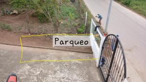 a sign that says pappezo on the side of a street at Como en Familia in Esquipulas +2 photos