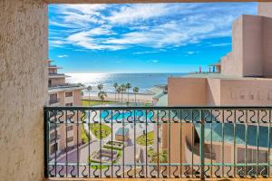 a balcony with a view of the ocean at Oceanfront hideaway at Sonoran Spa N608 in Puerto Peñasco