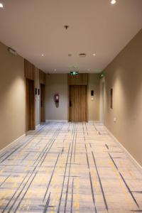 an empty hallway of an office building at فندق ليلة واحدة - One night hotel in Medina