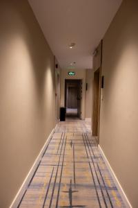 an empty hallway in an office building at فندق ليلة واحدة - One night hotel in Medina +24 photos