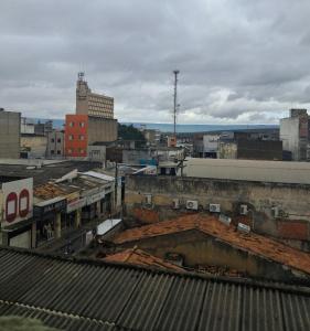 a view of a city with buildings and roofs at Bem no Centro in Juazeiro do Norte