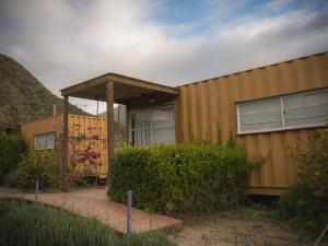a yellow house with a gazebo in front of it at Lavanda del Valle in Vicuña +34 photos