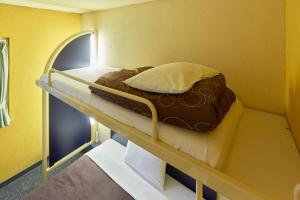 เตียงในห้องที่ Select Inn Numazu