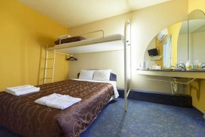 เตียงในห้องที่ Select Inn Numazu