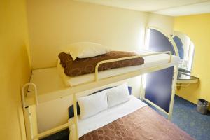 เตียงในห้องที่ Select Inn Numazu