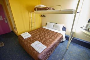 เตียงในห้องที่ Select Inn Numazu