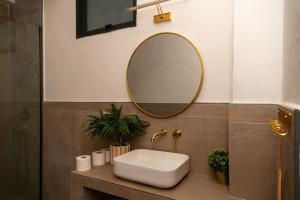 a bathroom with a sink and a mirror at Villa Narkis in Haad Yao +17 photos