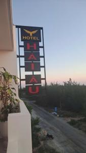a sign for a hotel on the side of a road at Hotel Hải Âu in Kỳ Trân (1)