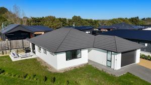 an overhead view of a house with a black roof at Que Syrah Syrah in Martinborough