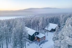 an aerial view of a house in the snow at Arctic Design Villa Levi in Levi