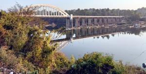 a bridge over a body of water at Tunga Vilasa in Tīrthahalli