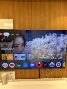 a television screen with several different apps on it at Cookie House in Seoul