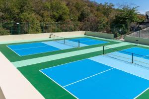 an overhead view of a tennis court at 3082 - Paradise Cove 3A Manzanillo in Tangolunda
