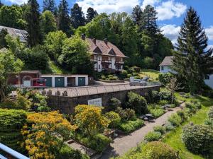a house on a hill with a garden at Hotel Fidelitas in Bad Herrenalb