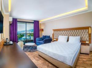 Llit o llits en una habitació de Michell Hotel & Spa - Adult Only - Ultra All Inclusive 38 fotos més