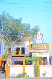 a building with a sign that reads vaughan park at Vatika palace in Ayodhya