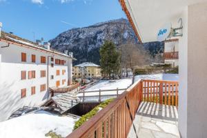 a balcony of a building with snow on the ground at Blanc 4810 in Pré-Saint-Didier