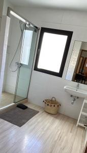 a bathroom with a shower and a sink and a window at Suites Appartement Midelt in Midelt +33 photos