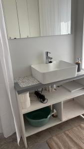a bathroom with a sink and a mirror at Domek nad Strugą przy stawach 10 km od Warszawy" Jacuzzi na zamówienie" in Halinow +48 photos