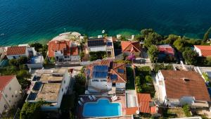 an aerial view of a town next to the water at Villa A'Mare in Seget Vranjica